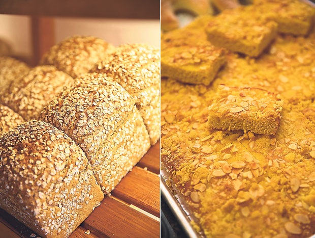 Pick up traditional breads that are made with longer fermentation times (left). At the counter, order this rustic almond butter cake that contains less sugar (right)