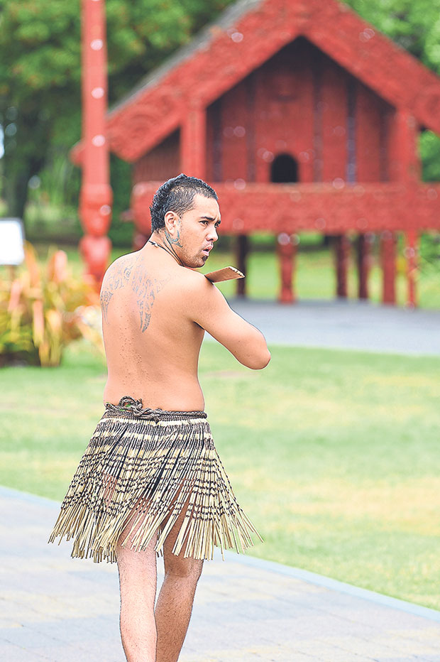 A cultural performer clad in the traditional piupiu at Te Puia