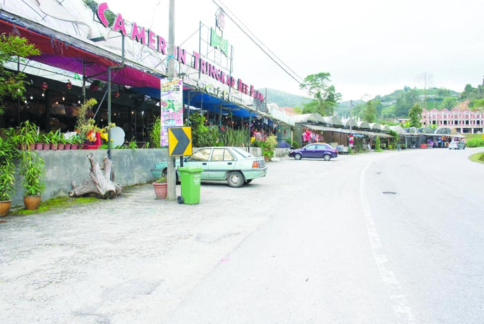 Business is down to a trickle at shops selling local products and souvenirs at Tringkap.