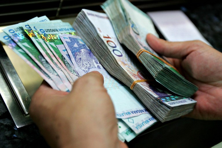 At 6pm, the ringgit slid to 4.1765/1795 against the greenback from 4.1750/1775 at yesterday’s close. — AFP pic