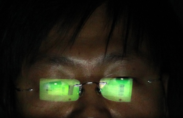 A hacker works on his laptop in his office in Taipei July 10, 2013. u00e2u20acu201d Reuters pic