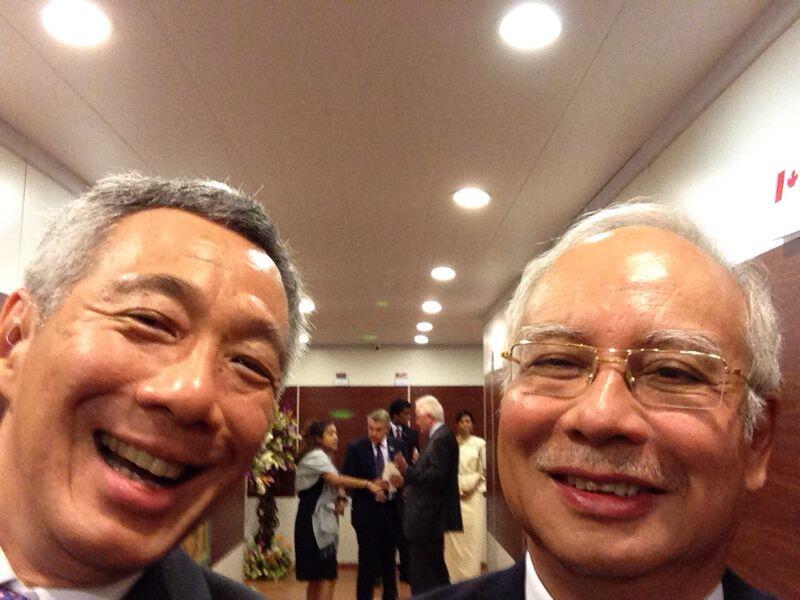 Singapore Prime Minister Lee Hsien Loong (left) takes a self-portrait with Prime Minister Datuk Seri Najib Razak on the sidelines of the the Commonwealth Heads of Government Meeting (CHOGM) in Sri Lanka, November 15, 2013. u00e2u20acu201d Picture from Leeu00e2u20acu2122s Twitter