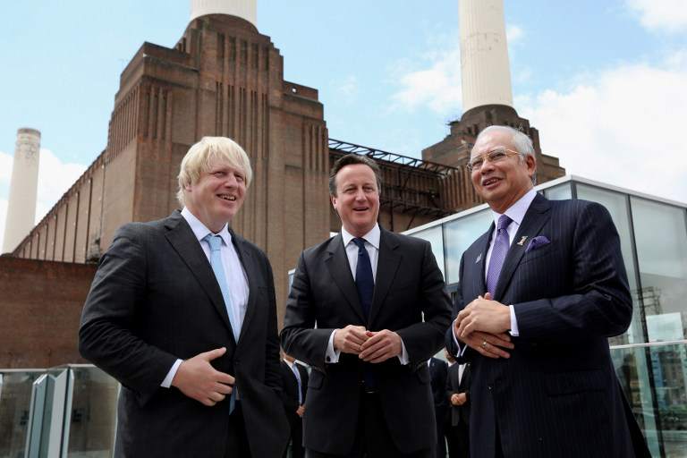 Prime Minister Datuk Seri Najib Razak with British Prime Minister David Cameron (centre) and London Mayor Boris Johnson (left) at Battersea Power Station in London on July 4, 2013. u00e2u20acu201d AFP pic