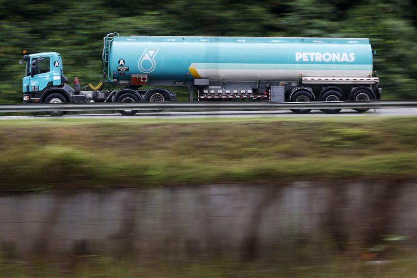 A Petronas tanker truck drives along a road in Kuala Lumpur, in this September 10, 2013 file picture. u00e2u20acu201d Reuters pic
