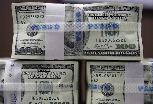 US 100-dollar bills are piled up after being counted at the Korea Exchange Bank (KEB) in Seoul October 13, 2008. u00e2u20acu201d Reuters pic